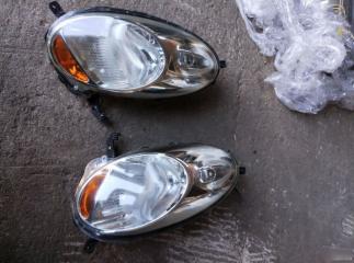 Запчасть фары Nissan March 2002-2010