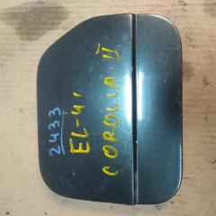 Фото запчасти лючок бензобака TOYOTA COROLLA II 1993 Б/У запчасть Запчасть лючок бензобака TOYOTA COROLLA II 1993