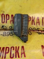 Фото запчасти крышка блока предохранителей TOYOTA COROLLA II 1993 Б/У запчасть Запчасть крышка блока предохранителей TOYOTA COROLLA II 1993