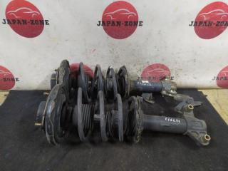 Стойка подвески передняя Nissan Primera 2001