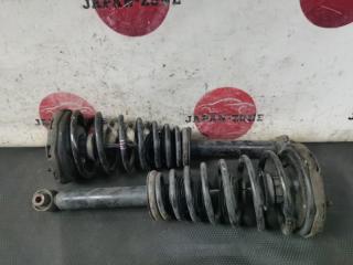 Стойка подвески передняя Nissan Primera 2000