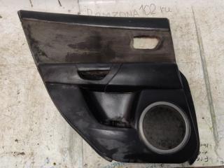 Запчасть обшивка двери задняя левая Mazda 3