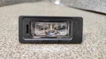 Запчасть фонарь подсветки номерного знака Audi Q7 2015-2023