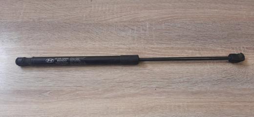 Запчасть амортизатор капота передний Hyundai Santa Fe 2005-2012