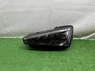 Фара левая Skoda Rapid