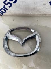 Фото запчасти эмблема задняя Mazda Mazda6 2008 контрактная запчасть Запчасть эмблема задняя Mazda Mazda6 2008