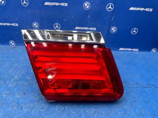 Фонарь в крышку багажника задний левый BMW 750 2011