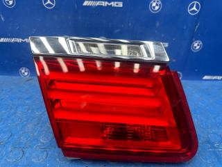Фонарь в крышку багажника задний левый BMW 740 2009