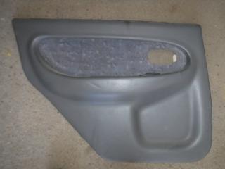 Запчасть обшивка двери задняя левая Kia Spectra 2006