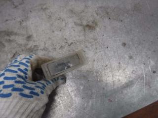 Запчасть фонарь подсветки заднего номера задний правый Chevrolet Cruze 2012