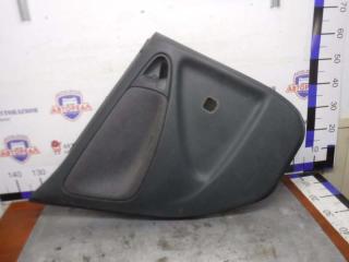 Запчасть обшивка двери задняя левая Toyota Vitz 1999