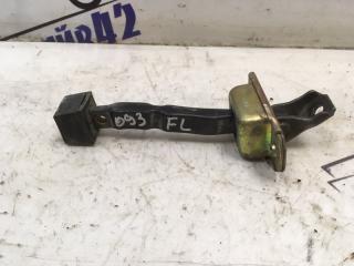 Запчасть ограничитель двери передний левый Mitsubishi Lancer Cedia 2001