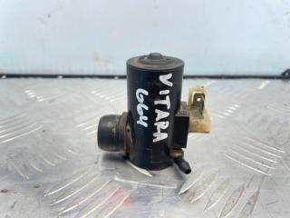 Фото запчасти насос омывателя задний Suzuki Grand Vitara 2007 Б/У запчасть Запчасть насос омывателя задний Suzuki Grand Vitara 2007