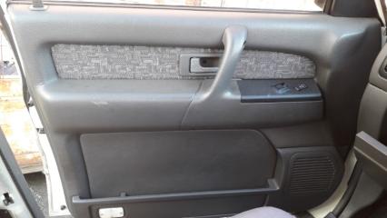 Запчасть обшивка двери передняя левая ISUZU Bighorn 1998-2002