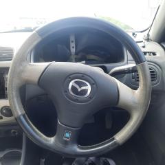 Запчасть руль MAZDA Familia 2000