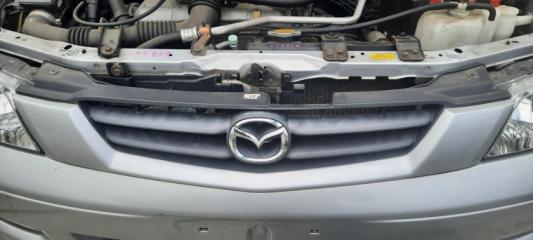 Решетка радиатора MAZDA Demio 1999