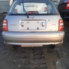 Бампер задний NISSAN March 2001