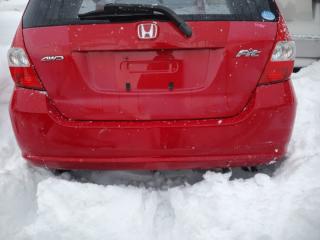 Бампер задний HONDA Fit 2004