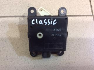 Запчасть моторчик заслонки отопителя Nissan Almera Classic 2006-2013