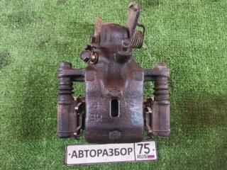 Суппорт тормозной задний правый NISSAN TINO 1999