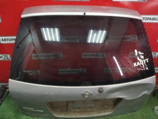 Стекло заднее NISSAN TINO 1999