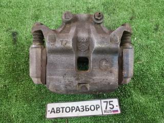 Суппорт тормозной передний левый NISSAN TINO 1998