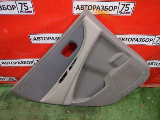 Обшивка двери задняя левая NISSAN TINO 1999