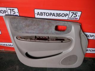Обшивка двери передняя левая TOYOTA COROLLA SPACIO 1997