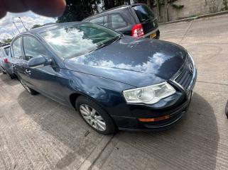 Суппорт тормозной задний левый Passat 2008 B6 BXE 1.9