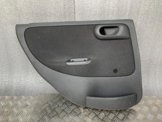 Обшивка двери задняя левая Opel Corsa 2000-2006