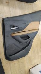 Фото запчасти обшивка двери задняя правая Opel Mokka 2016 Б/У запчасть Запчасть обшивка двери задняя правая Opel Mokka 2016