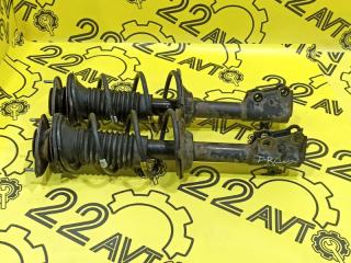 Стойка в сборе комплект передняя Toyota ist 2002
