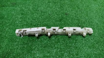 Фото запчасти крепление бампера переднее правое NISSAN NV200 2010 контрактная запчасть Запчасть крепление бампера переднее правое NISSAN NV200 2010