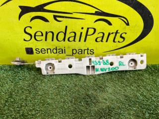 Фото запчасти крепление бампера заднее левое NISSAN NV200 2009 контрактная запчасть Запчасть крепление бампера заднее левое NISSAN NV200 2009